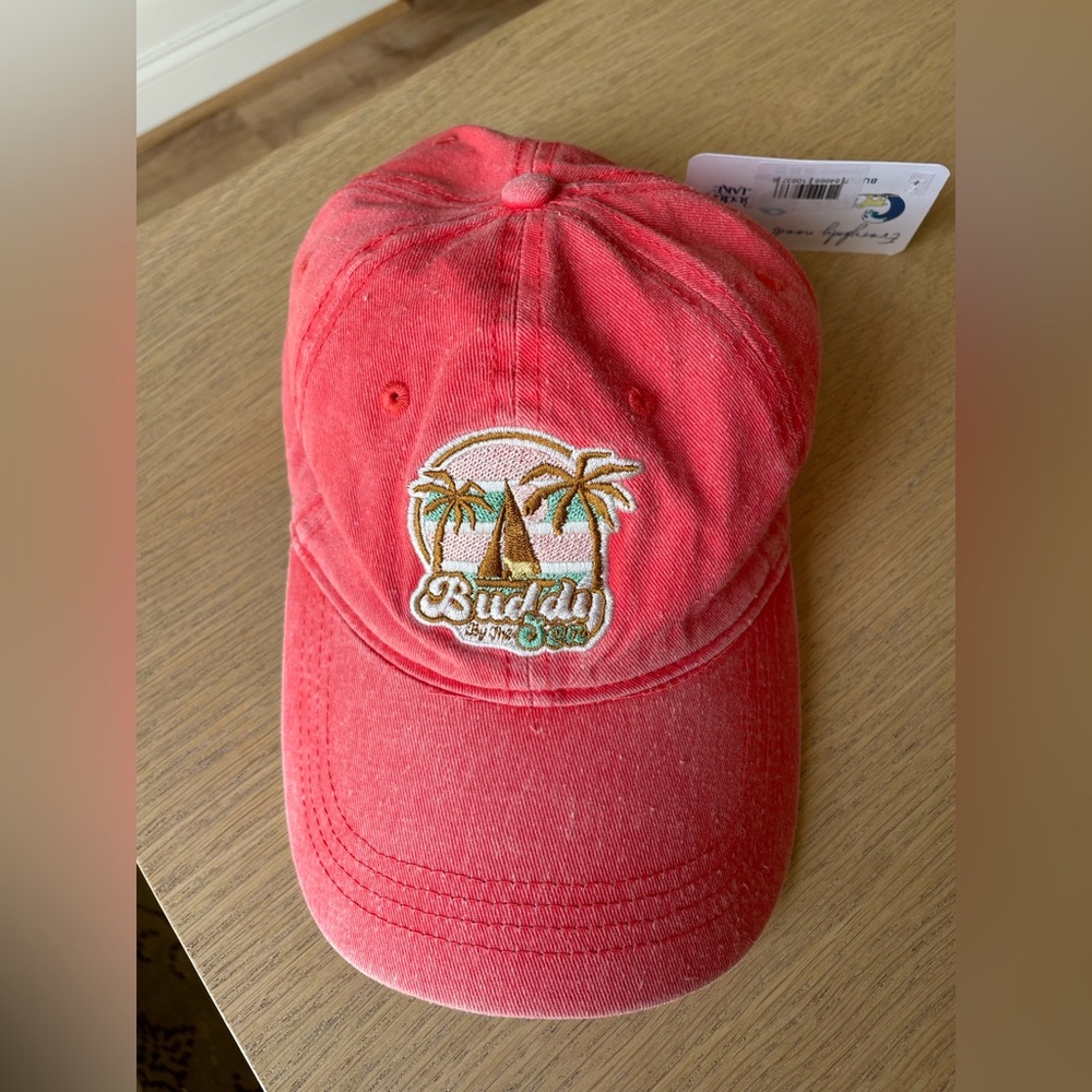 New with tags hat, coral color Buddy by the Sea